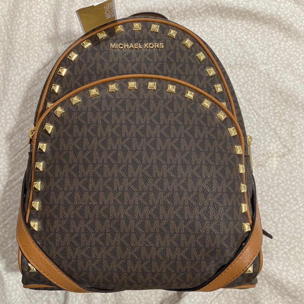 Michael Kors brand new just unpacked inside materials to post pictures. NWT